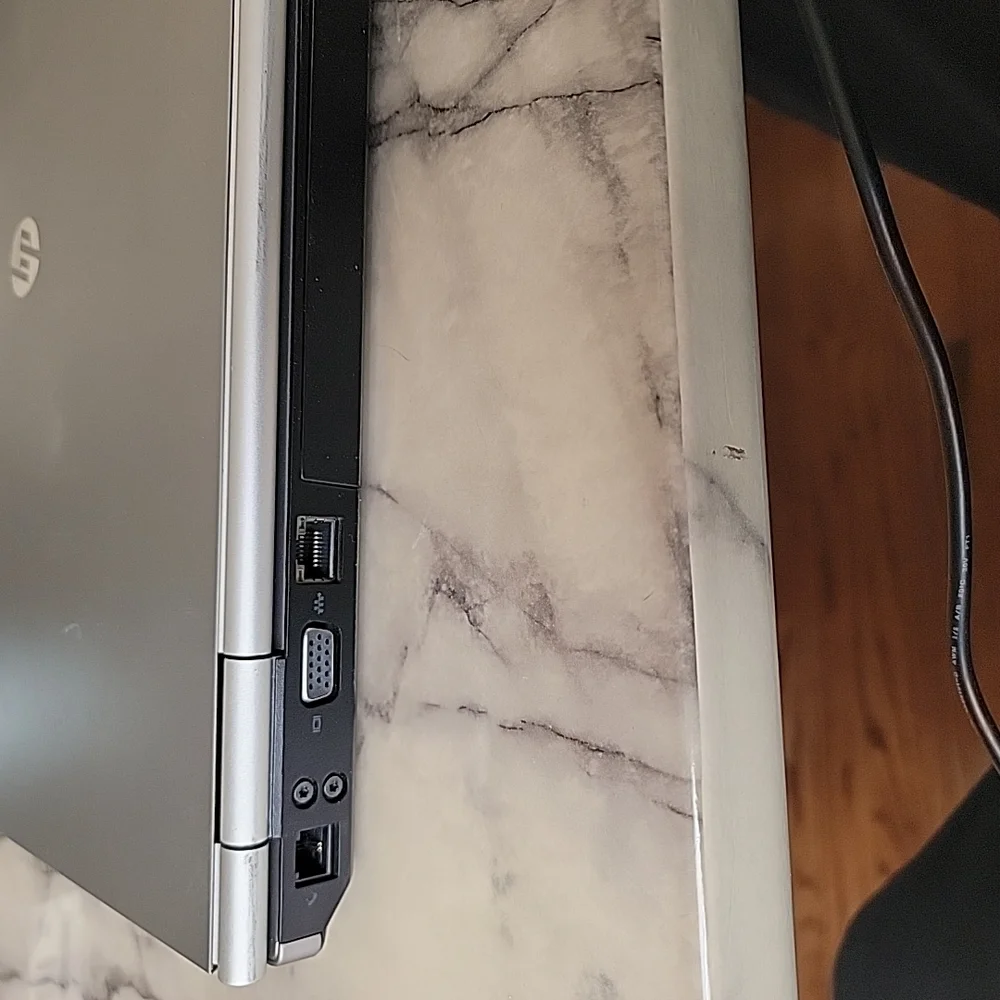 HP Silver and Black Laptop with Sleek Design and QWERTY Keyboard